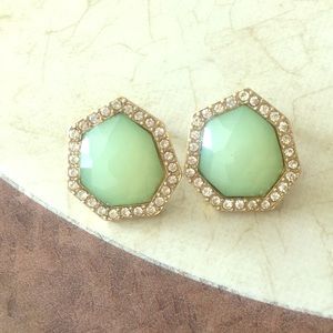 Green earrings.